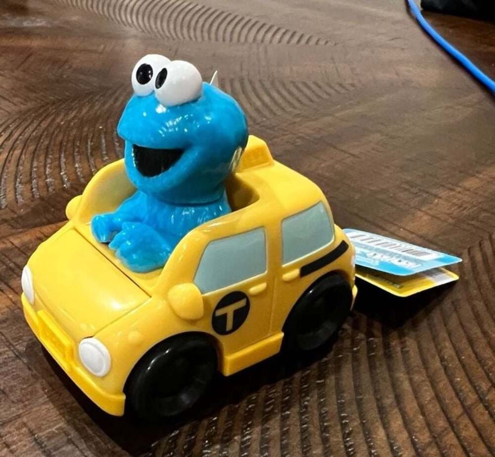 Sesame Street Twist and Pop Wheelies Cookie Monster Yellow Taxi Vehicle Toy